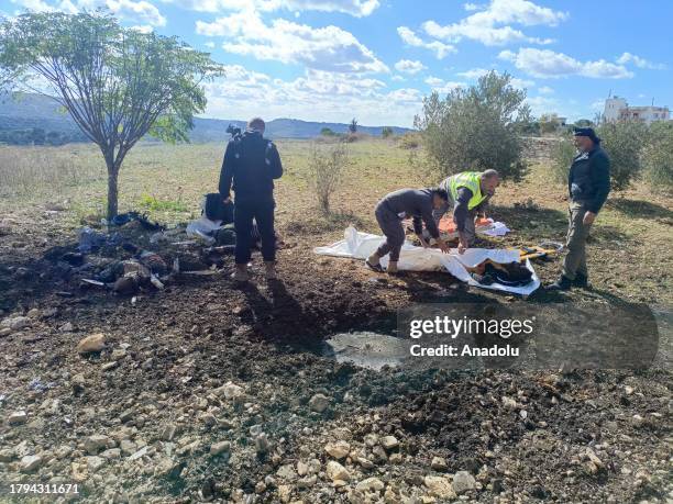 Officials carry the dead bodies after it was stated that 3 people, including 2 journalists, killed in the Israeli air strike on the south of Lebanon...