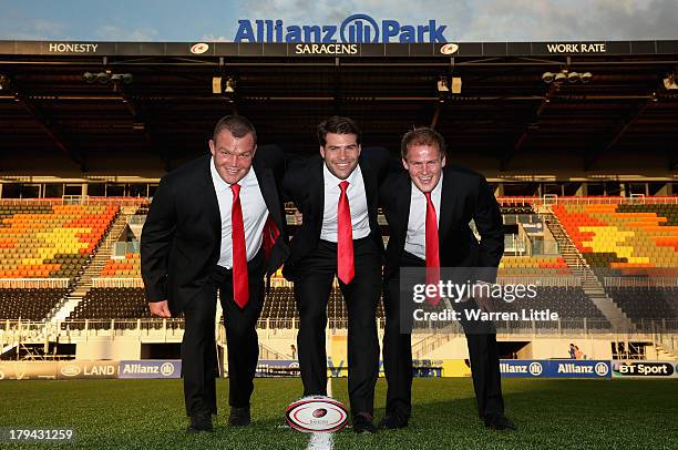 Matt Stevens, Schalk Brits and Rhys Gill of Saracens pose with their new Apsley taylored suits during the season launch at Allianz Park on September...