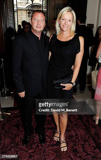 Matthew Freud and Elisabeth Murdoch arrive at the GQ Men of the Year awards at The Royal Opera House on September 3, 2013 in London, England.
