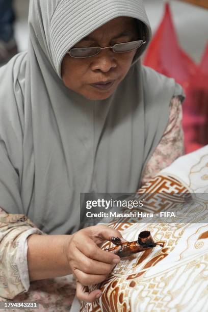 Women make BATIK at House of Danar Hadi on November 14, 2023 in Surakarta, Java, Indonesia.