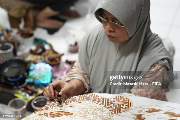 Women make BATIK at House of Danar Hadi on November 14, 2023 in Surakarta, Java, Indonesia.