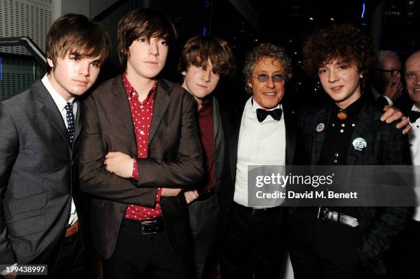 Roger Daltrey poses with Evan Walsh, Josh McClorey, Ross Farrelly and Pete O'Hanlon of The Strypes at the GQ Men of the Year awards at The Royal...