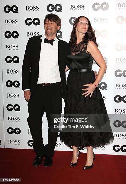 Alex James and Claire Neate attend the GQ Men of the Year awards at The Royal Opera House on September 3, 2013 in London, England.