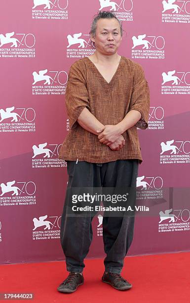Director Kim Ki-duk attends the "Moebius" Photocall during the 70th Venice International Film Festival at Sala Grande on September 3, 2013 in Venice,...