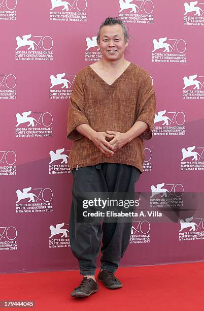 Director Kim Ki-duk attends the "Moebius" Photocall during the 70th Venice International Film Festival at Sala Grande on September 3, 2013 in Venice,...