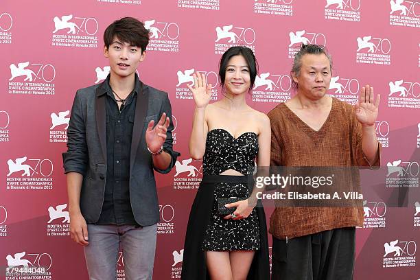 Actor Seo Young Ju, actress Lee Eun-Woo and director Kim Ki-duk attend the "Moebius" Photocall during the 70th Venice International Film Festival at...