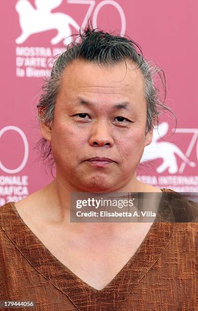 Director Kim Ki-duk attends the "Moebius" Photocall during the 70th Venice International Film Festival at Sala Grande on September 3, 2013 in Venice,...