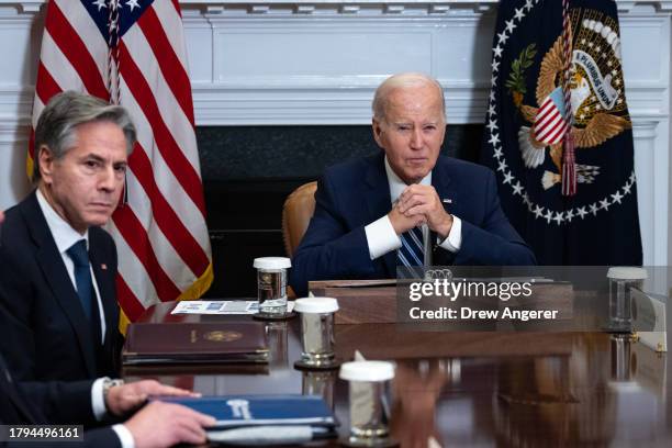 Secretary of State Antony Blinken looks on as U.S. President Joe Biden speaks during a meeting about countering the flow of fentanyl into the United...