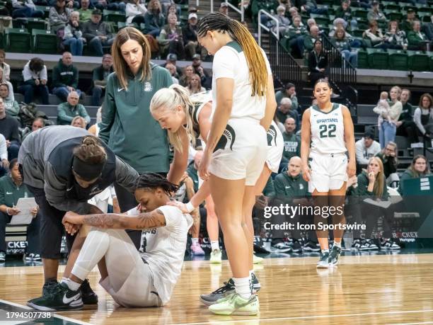 Michigan State Spartans guard Gabby Elliott suffers an ACL injury during a college basketball game between the Evansville Purple Aces and the...