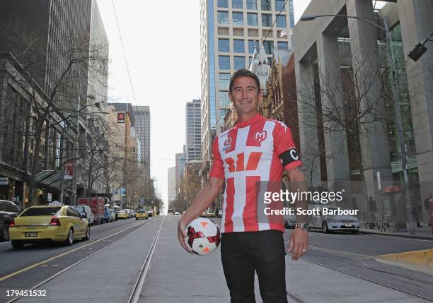 Harry Kewell of the Heart poses during a press conference to announce the Melbourne Heart A-League captain at the Westpac Collins St branch on...