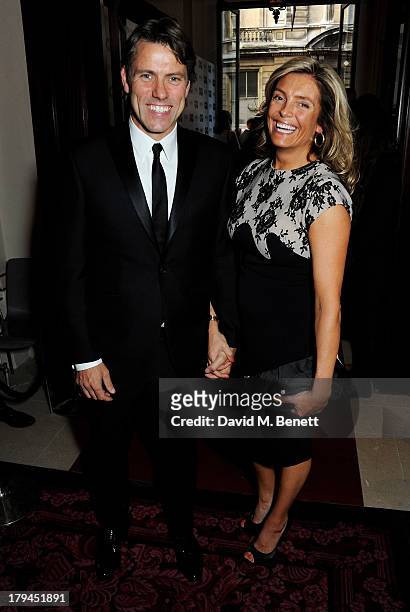 John Bishop and wife Melanie Bishop arrive at the GQ Men of the Year awards at The Royal Opera House on September 3, 2013 in London, England.