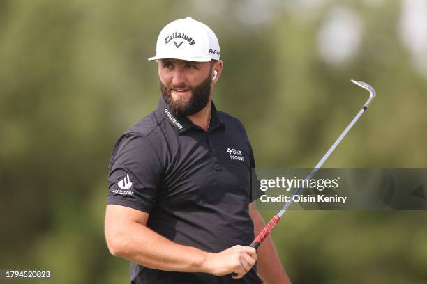 Jon Rahm of Spain looks across the practice range prior to the DP World Tour Championship on the Earth Course at Jumeirah Golf Estates on November...