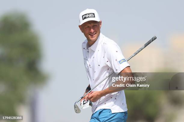 Adrian Meronk of Poland looks across the practice chipping area prior to the DP World Tour Championship on the Earth Course at Jumeirah Golf Estates...