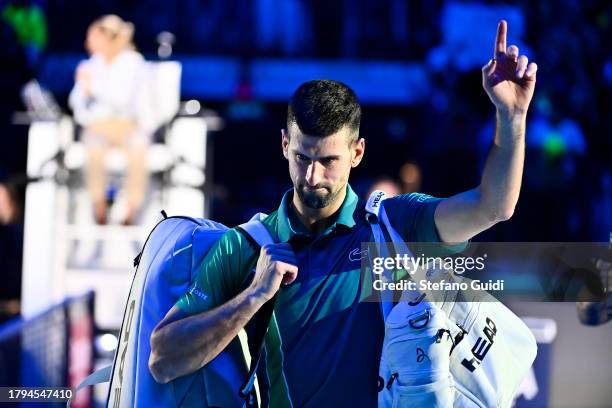 Novak Djokovic of Serbia reacts after the loses against Jannik Sinner of Italy during their Men's Single's Nitto ATP Finals match during day two of...