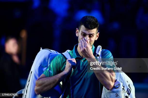 Novak Djokovic of Serbia reacts after the loses against Jannik Sinner of Italy during their Men's Single's Nitto ATP Finals match during day two of...