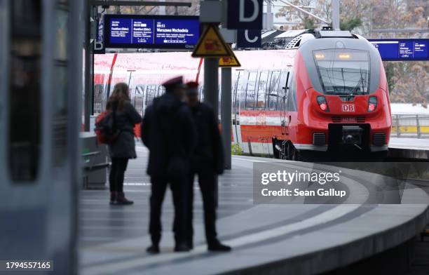 Regional train of German state rail carrier Deutsche Bahn departs from Hauptbahnhof main railway station on November 15, 2023 in Berlin, Germany....