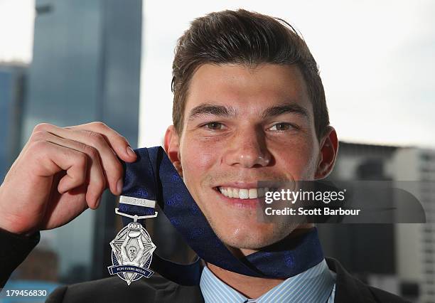 Jaeger O'Meara of the Gold Coast Suns poses after winning the 2013 Ron Evans Medal NAB Rising Star Award as the best young player in the AFL at Crown...