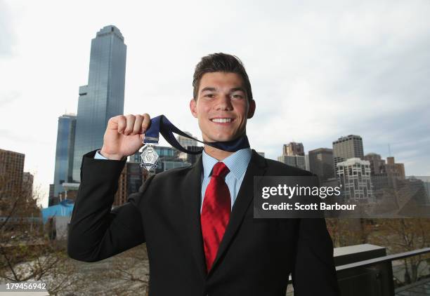 Jaeger O'Meara of the Gold Coast Suns poses after winning the 2013 Ron Evans Medal NAB Rising Star Award as the best young player in the AFL at Crown...