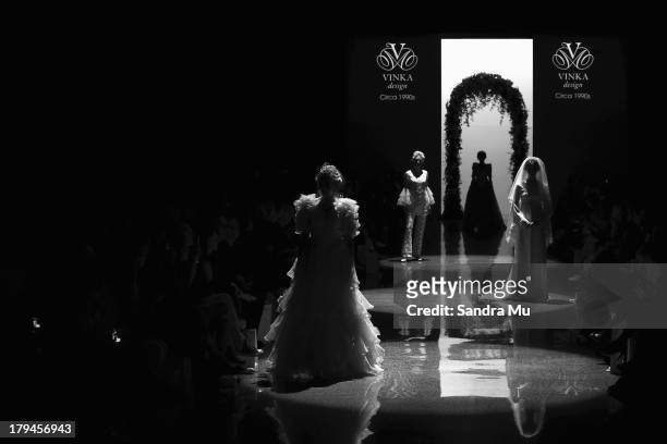 Models showcase designs by Vinka during the New Zealand Weddings Magazine Bridal Collection on the runway during New Zealand Fashion Week at the...