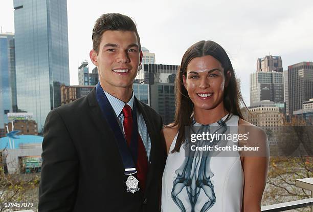 Jaeger O'Meara of the Gold Coast Suns poses with his girlfriend Rhiannon Joyce after winning the 2013 Ron Evans Medal NAB Rising Star Award as the...
