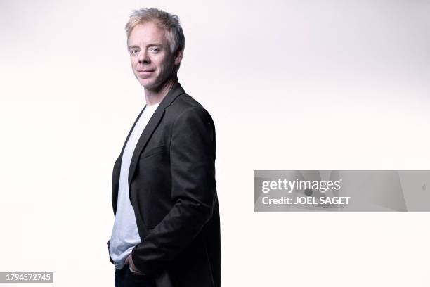 Canadian comic book author Marc Delafontaine aka "Delaf" poses during a photo session in Paris, on November 20, 2023. Delaf is the author of the new...