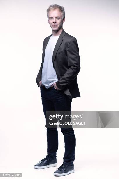 Canadian comic book author Marc Delafontaine aka "Delaf" poses during a photo session in Paris, on November 20, 2023. Delaf is the author of the new...