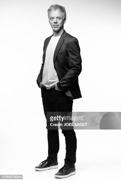 Canadian comic book author Marc Delafontaine aka "Delaf" poses during a photo session in Paris, on November 20, 2023. Delaf is the author of the new...