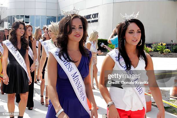 Miss America contestants attends 2014 Miss America Contestants Photo Call at Atlantic City International Airport on September 3, 2013 in Atlantic...