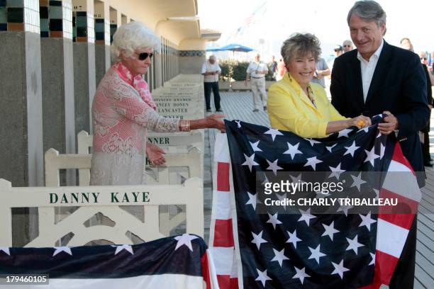 Danny Kaye's daughter Dena Kaye unveils the beach locker room dedicated to her father on the Promenade des Planches with Anne d'Ornano and...