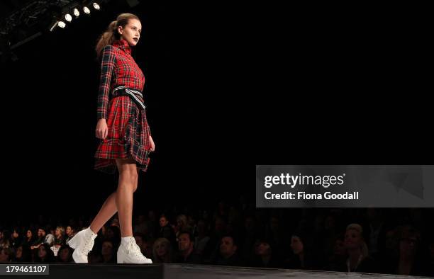 Model showcases designs by Trelise Cooper on the runway during New Zealand Fashion Week at the Viaduct Events Centre on September 4, 2013 in...