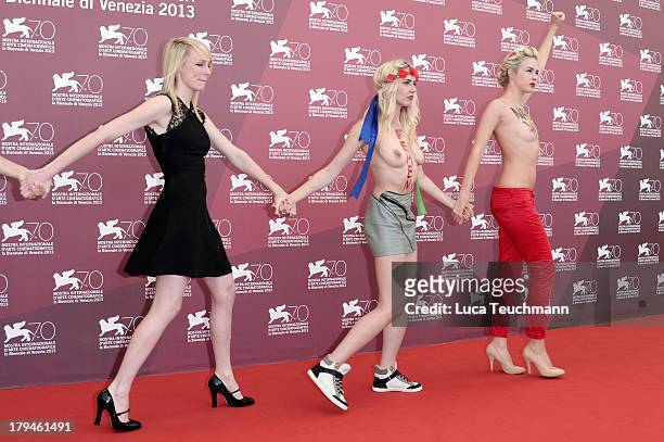 Director Kitty Green with Femen activists Inna Shevchenko and Sasha Shevchenko attends "Ukraine Is Not A Brothel" Photocall during the 70th Venice...