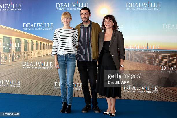 Director Matt Creed, US producer Isabella Tzenkova and US actress Amy Grantham pose during a photocall to present "Lily", his latest movie on...