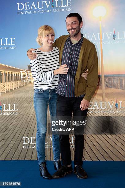 Director Matt Creed and US actress Amy Grantham pose during a photocall to present "Lily", his latest movie on September 4, 2013 as part of the...
