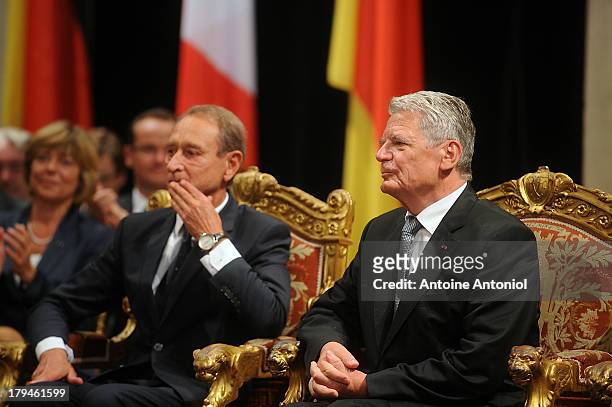 Mayor of Paris Bertrand Delanoe and German President Joachim Gauck pause during a reception at Paris city hall on September 4, 2013 in Paris, France....