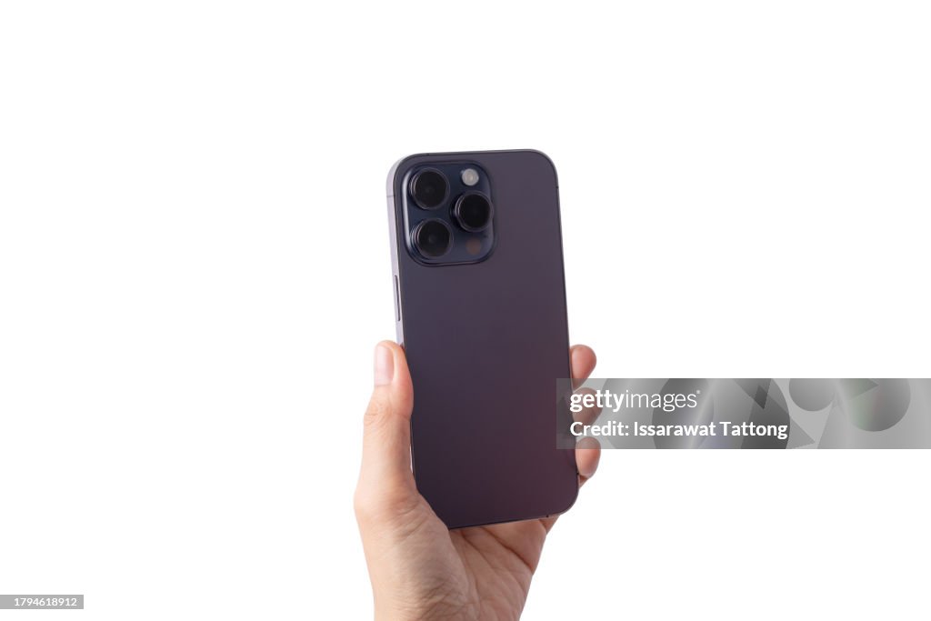 Female hand holding on mobile smartphone selfie ,show back side.