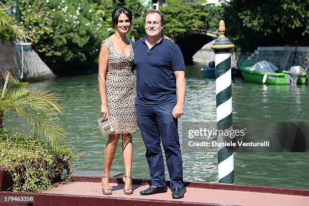 Actress Maria Grazia Cucinotta and Giulio Violati are seen during the 70th Venice International Film Festival on September 4, 2013 in Venice, Italy.