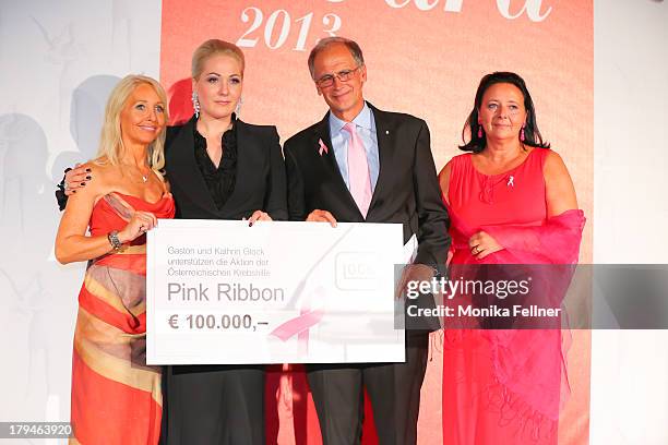 Kathrin Glock donates Euros 100.000 to the Pink Ribbon cause during the Leading Ladies Awards 2013 at Belvedere Palace on September 3, 2013 in...