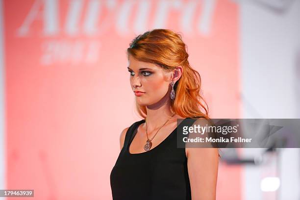 Model showcases Wempe designs on the catwalk during the Leading Ladies Awards 2013 at Belvedere Palace on September 3, 2013 in Vienna, Austria.
