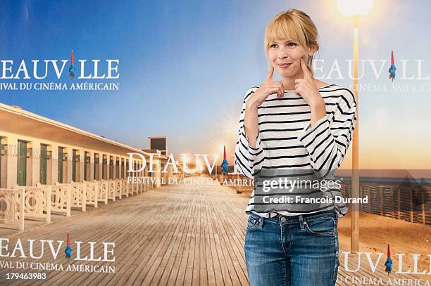 Amy Grantham poses at a photocall for the film 'Lily' during the 39th Deauville Film Festival on September 4, 2013 in Deauville, France.