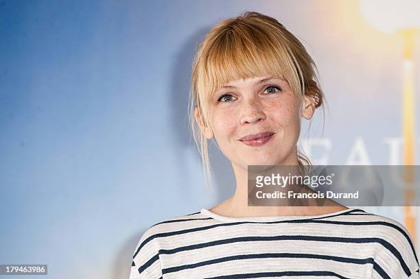 Amy Grantham poses at a photocall for the film 'Lily' during the 39th Deauville Film Festival on September 4, 2013 in Deauville, France.