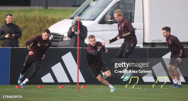 Pascal Gross, Joshua Kimmich, Julian Brandt and Jonas Hofmann exercise during a training session of the German national football team at DFB-Campus...
