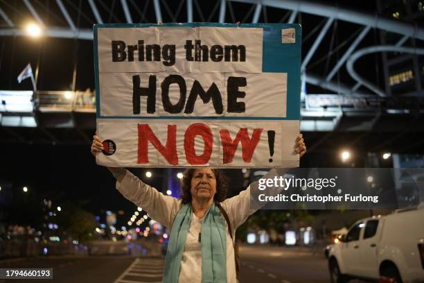 People demonstrate prior any hostage announcements outside the Kirya defense complex as the political cabinet hold a meeting on November 21, 2023 in...