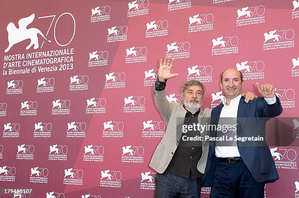 Director Gianni Amelio and actor Antonio Albanese attend 'L'Intrepido' Photocall during the 70th Venice International Film Festival at Palazzo del...