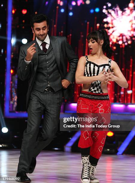 Bollywood actor Rishi Kapoor with Jhalak Dikhla Jaa participant Lauren Gottlieb on dance reality show Jhalak Dikhhla Jaa on September 3, 2013 in...