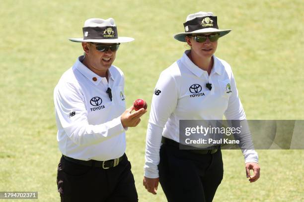 Umpires Sam Nogajski and Claire Polosak walk from the field during the Sheffield Shield match between Western Australia and South Australia at the...