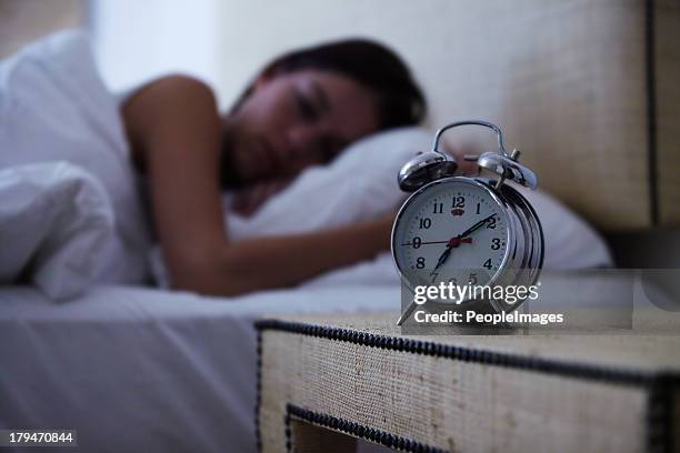 sleeping the day away - alarm clock on nightstand stock pictures, royalty-free photos & images