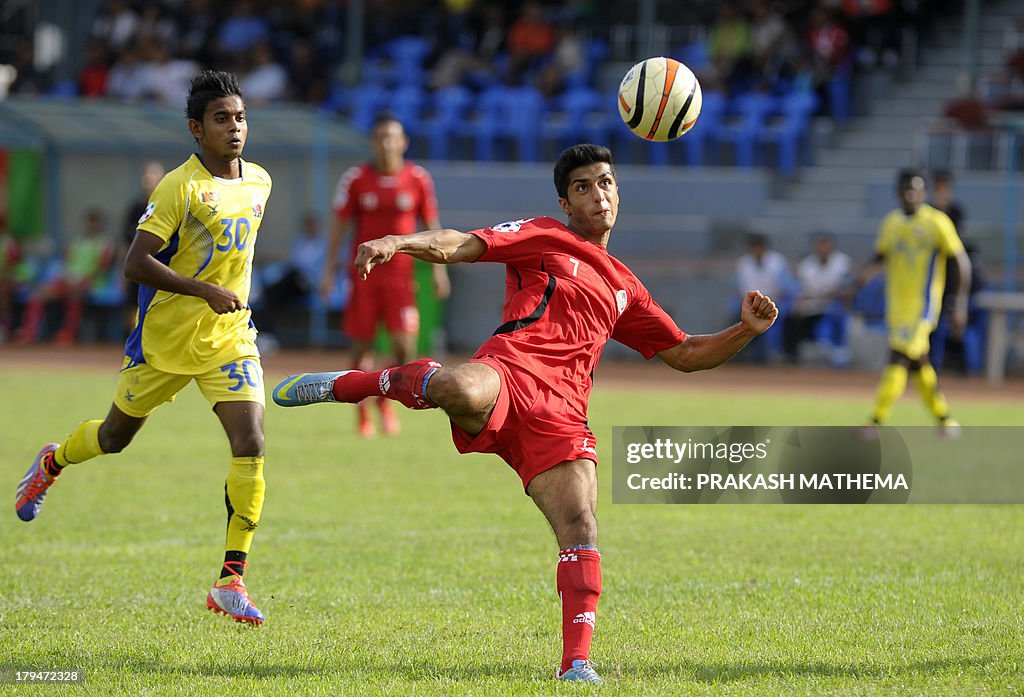Said Ravanfar Football Afghanistan football player Mustafa Hadid vies for the ball with Sri ...