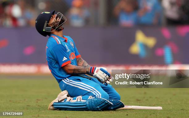 Virat Kohli of India celebrates after scoring a century, overtaking Sachin Tendulkar for the all time most ODI centuries during the ICC Men's Cricket...