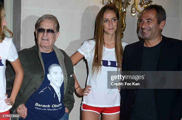 Daniel Filipacchi , Jean Yves Le Fur and an hostess attend the Lui Magazine Launch Party at 34 Avenue Foch on September 3, 2013 in Paris, France.