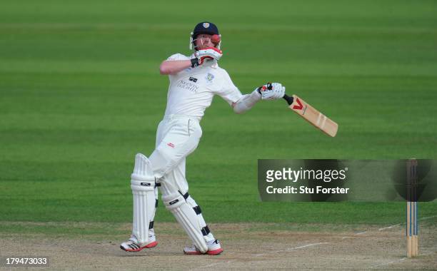 Durham batsman Paul Collingwood is unsettled by a short ball from Steve Magoffin during day two of the LV County Championship Division One match...